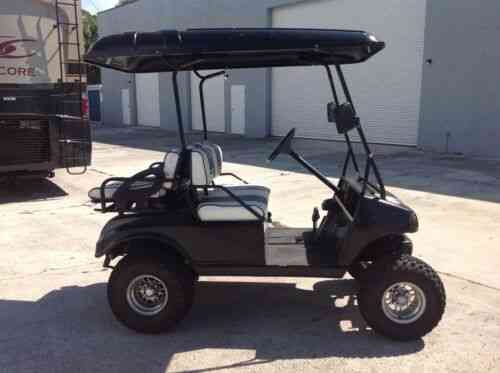 Black Club Car Ds 4 Seat Passenger Golf Cart Electric Lifted Vans Suvs And Trucks Cars