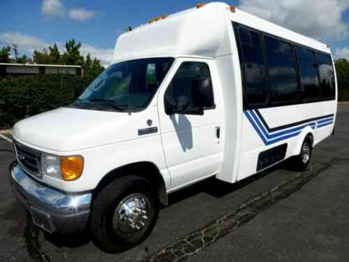 Federal Shuttle Bus With Co-pilot Seating Well: Vans, SUVs, and Trucks Cars